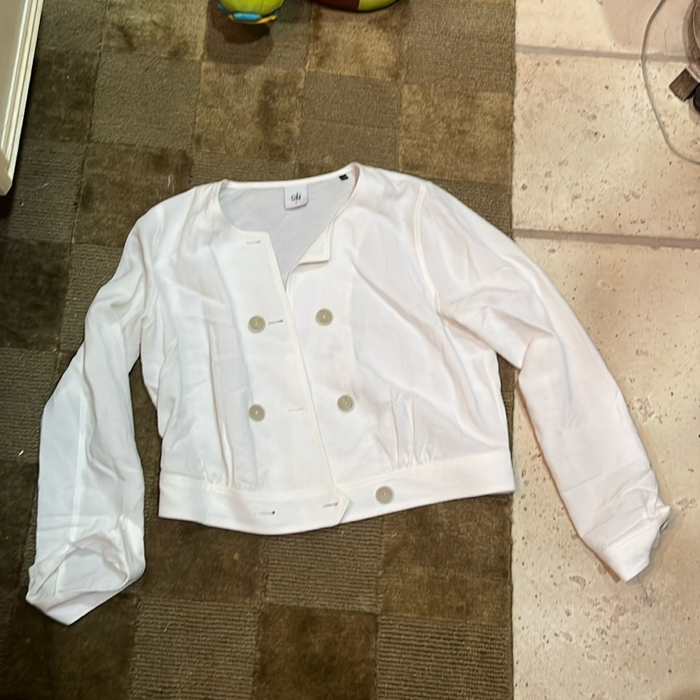 White linen sailor style jacket.